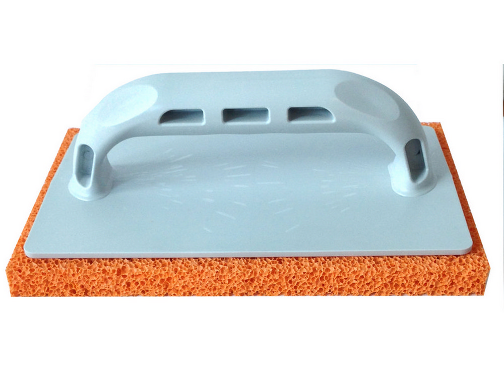 FRATTAZZO IN GOMMA MANICO IN PLASTICA Col. Arancio (a grana grossa) cm. 14x22
